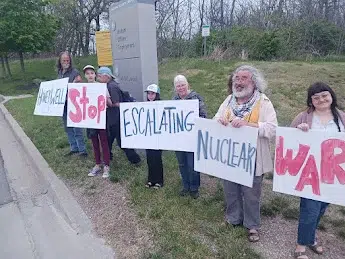 About 50 persons protested at a nuclear weapon factory in Kansas City, MO. See our pictures!